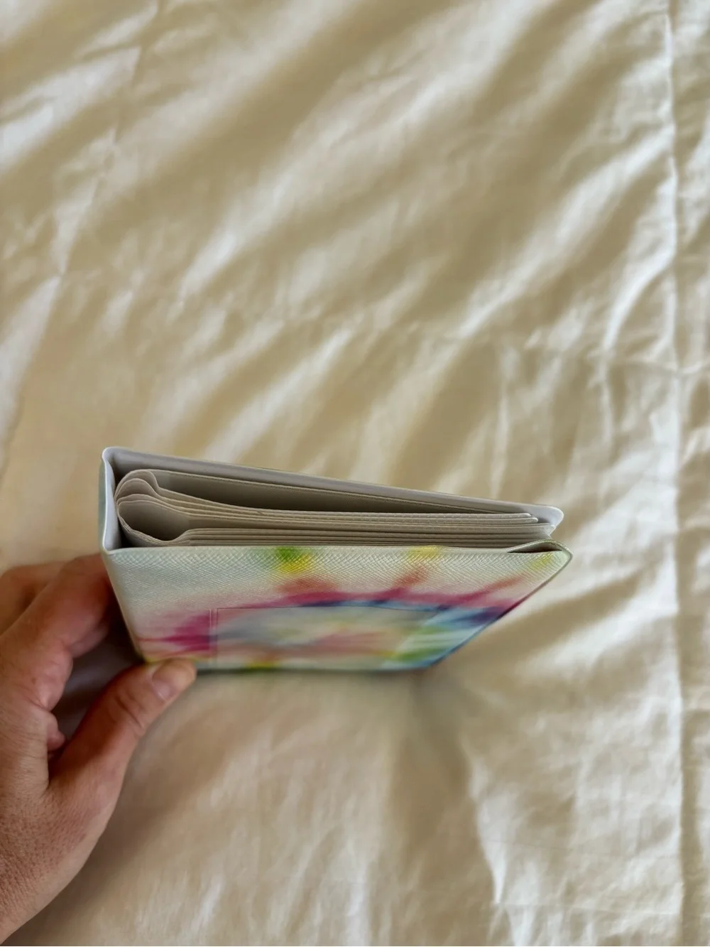 Fujifilm Instax Mini tie-dye photo album textured, multicolored spiral pattern